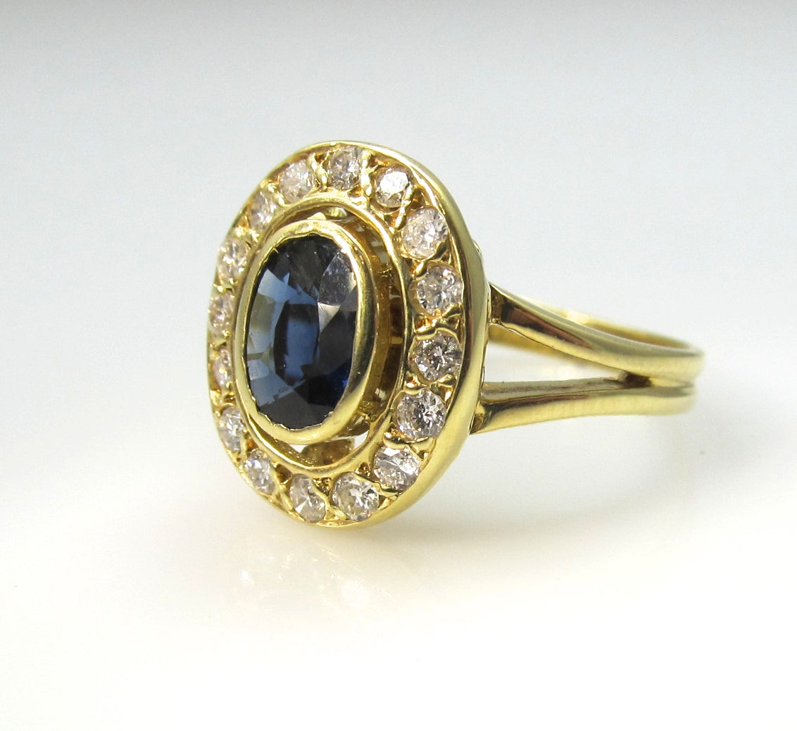 Estate 18k yellow gold sapphire diamond halo ring