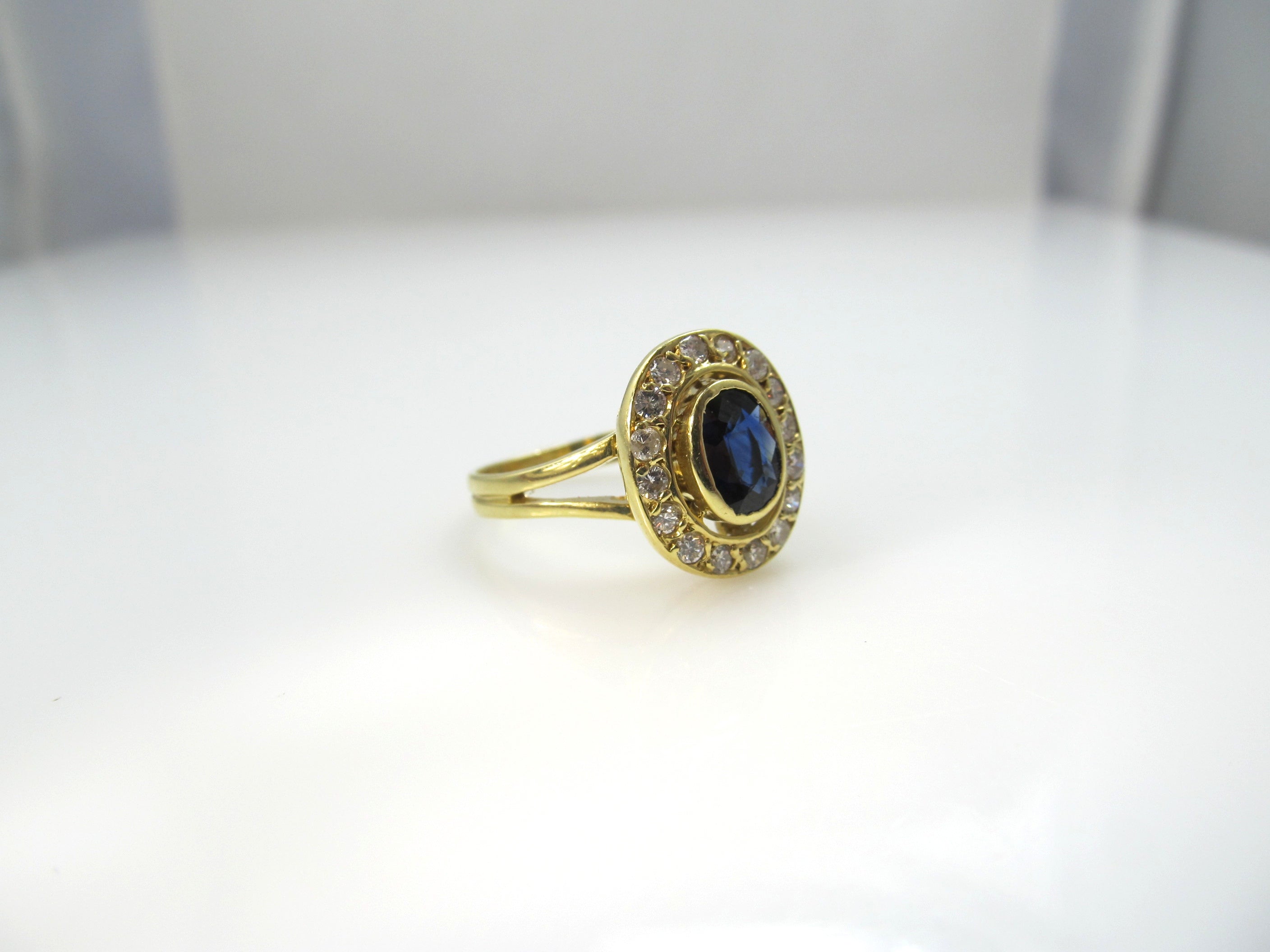 Estate 18k yellow gold sapphire diamond halo ring