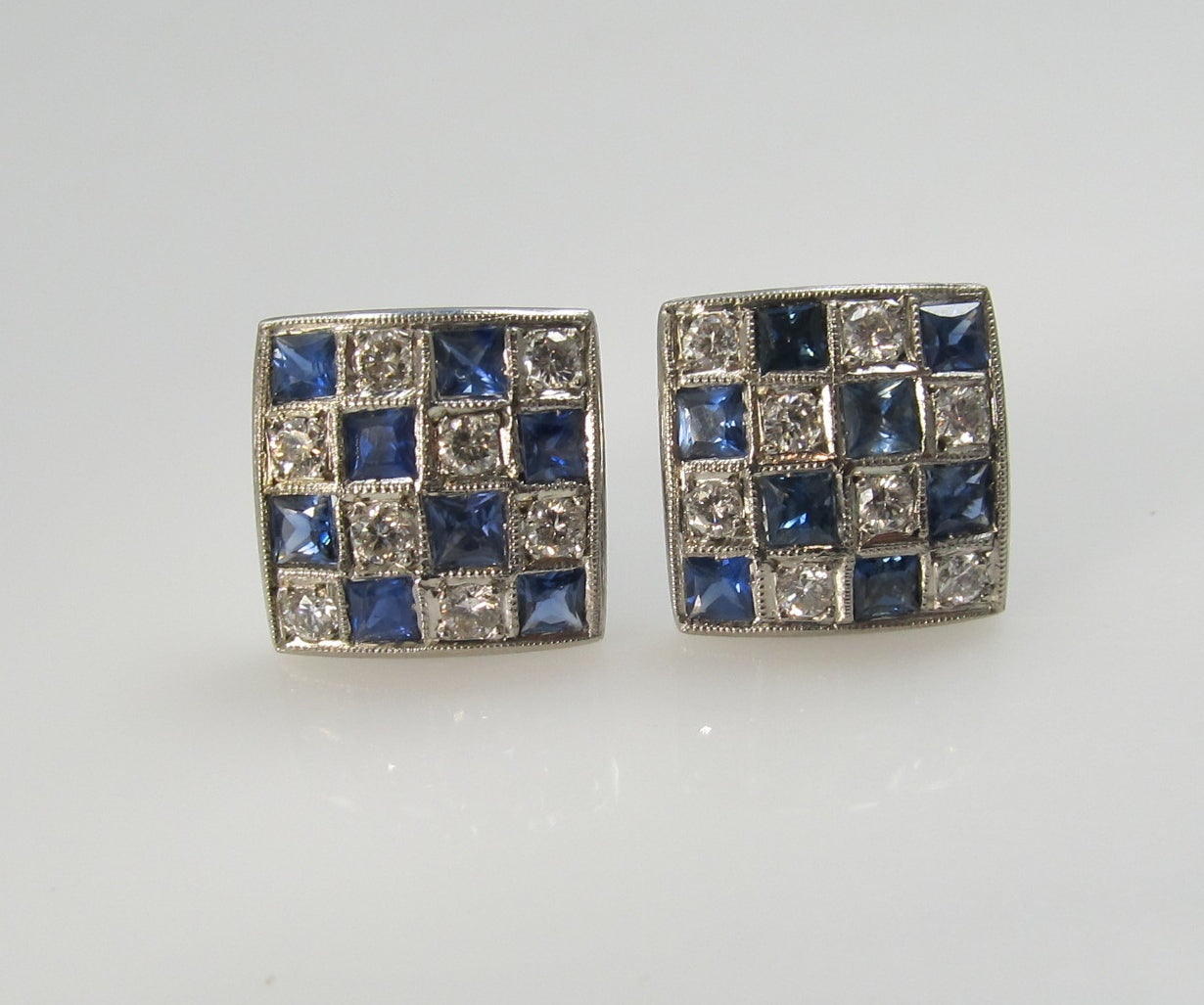 Antique platinum checkerboard earrings with sapphires and diamonds