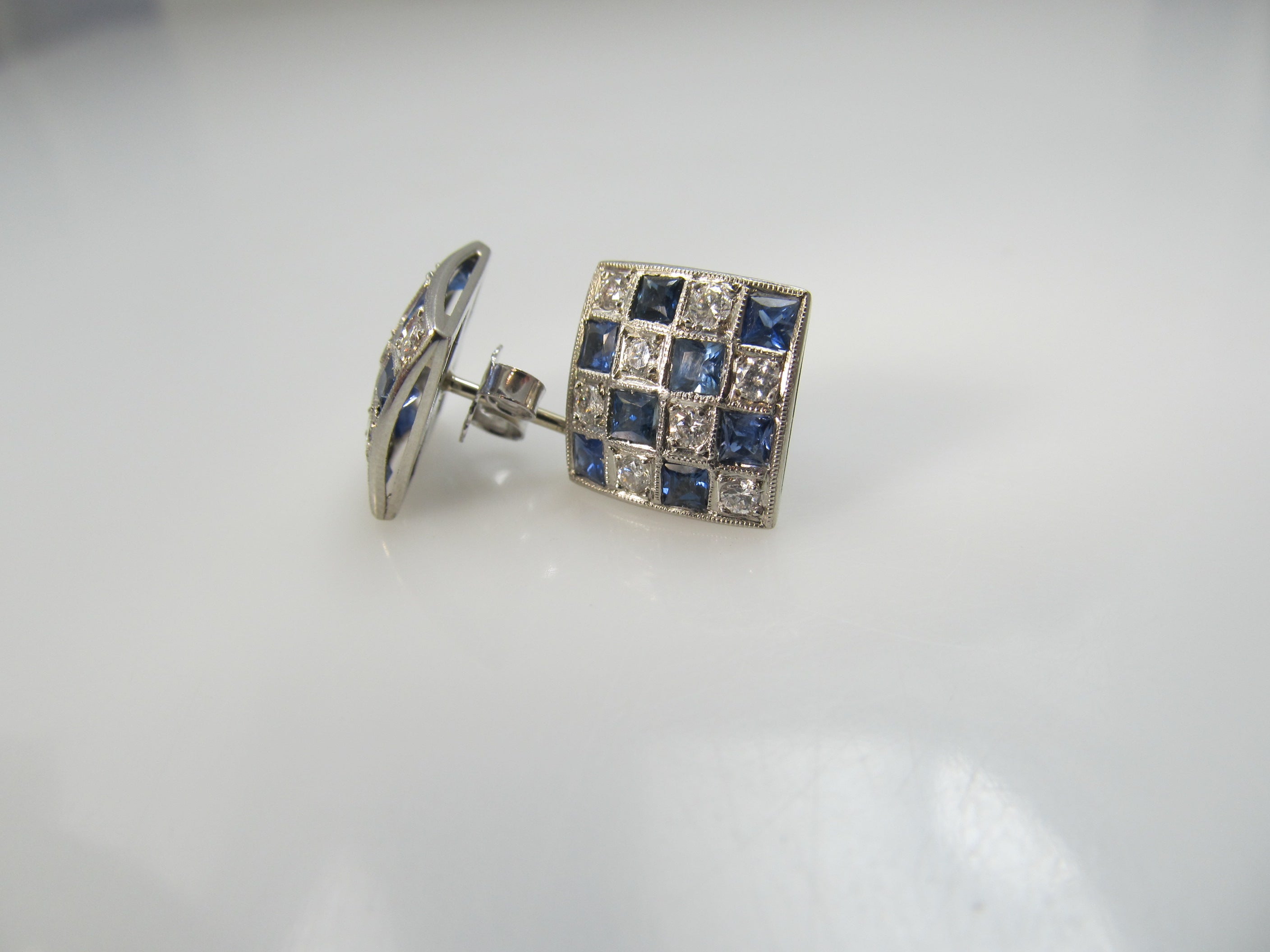 Antique platinum checkerboard earrings with sapphires and diamonds