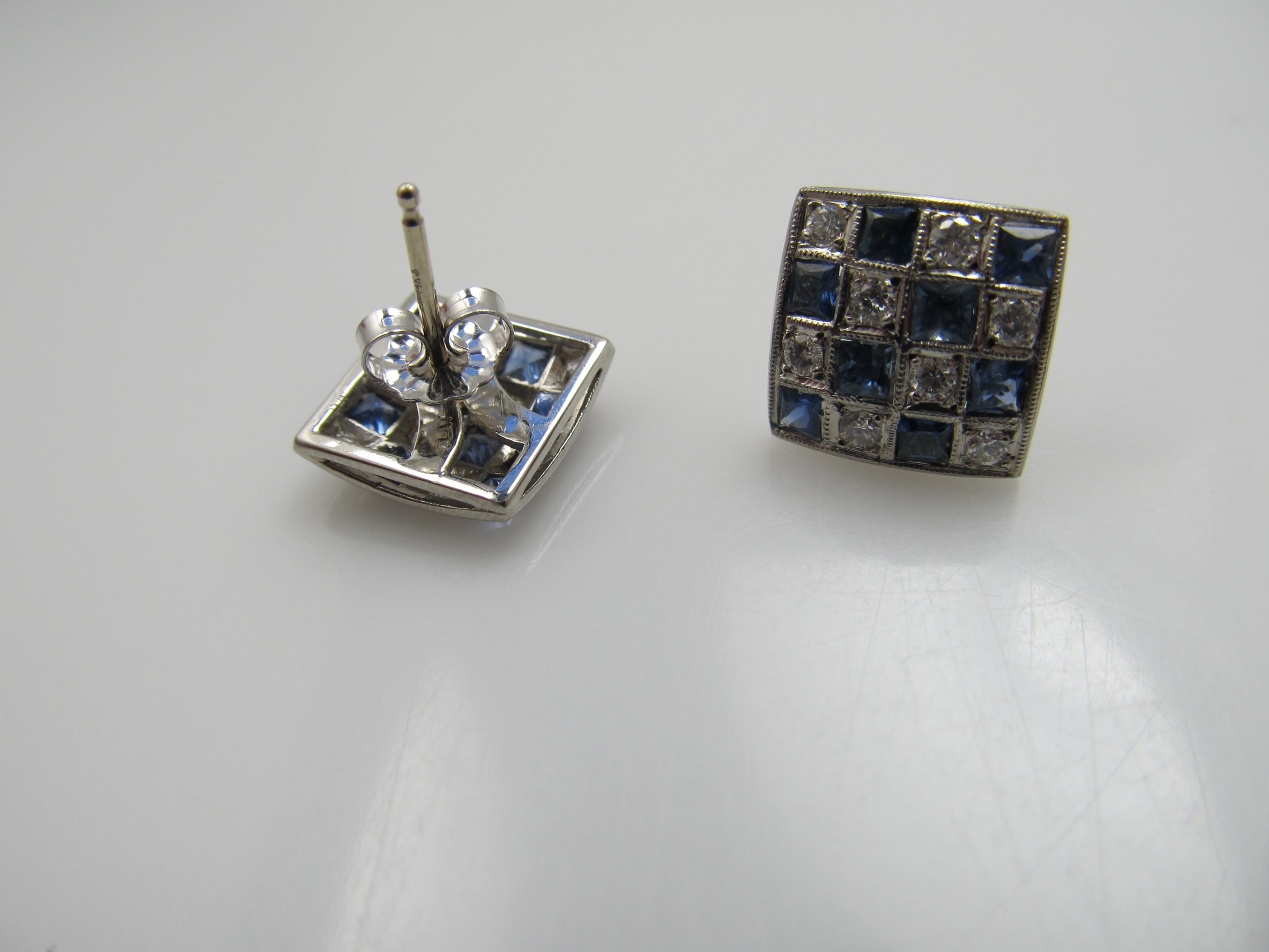 Antique platinum checkerboard earrings with sapphires and diamonds