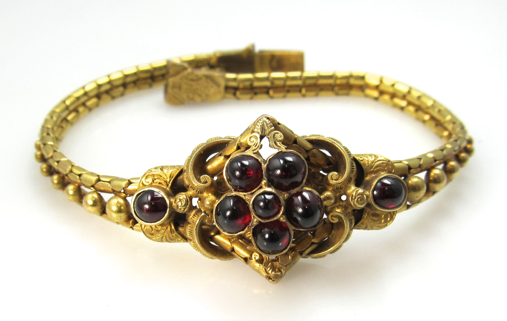 Victorian 14k yellow gold garnet cabochon bracelet, circa 1870