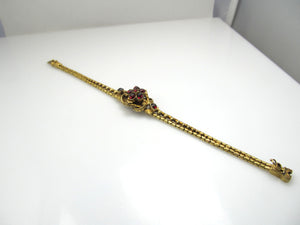 Victorian 14k yellow gold garnet cabochon bracelet, circa 1870