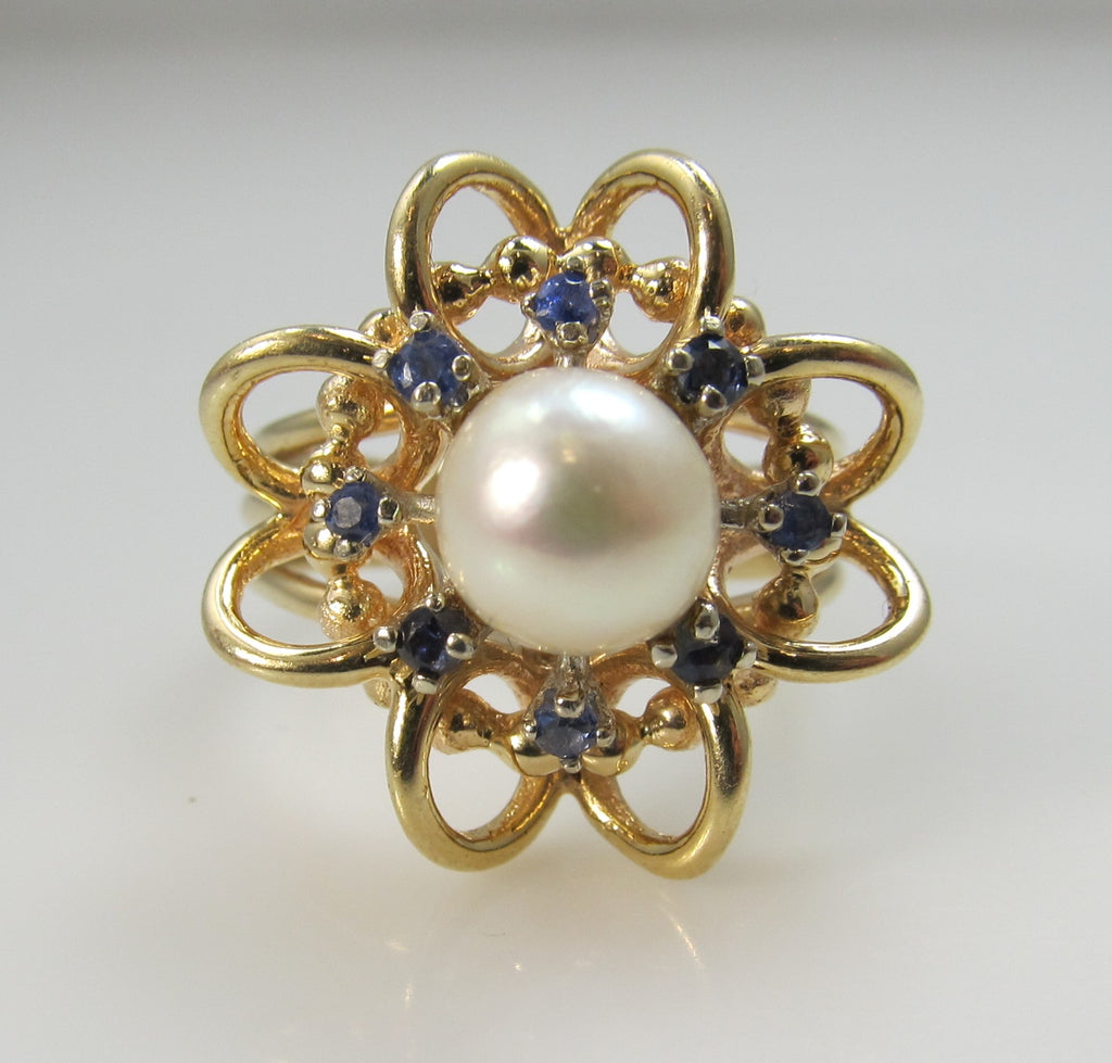 14k yellow gold ring with sapphires and a pearl