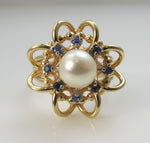 14k yellow gold ring with sapphires and a pearl