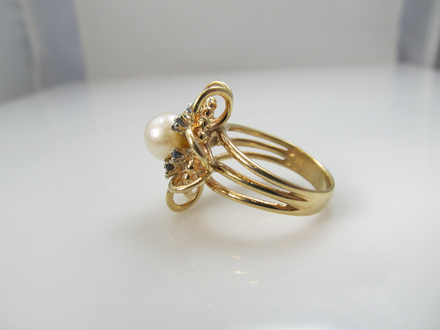 14k yellow gold ring with sapphires and a pearl