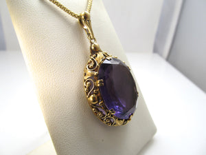 Vintage 14k yellow gold necklace with a large amethyst