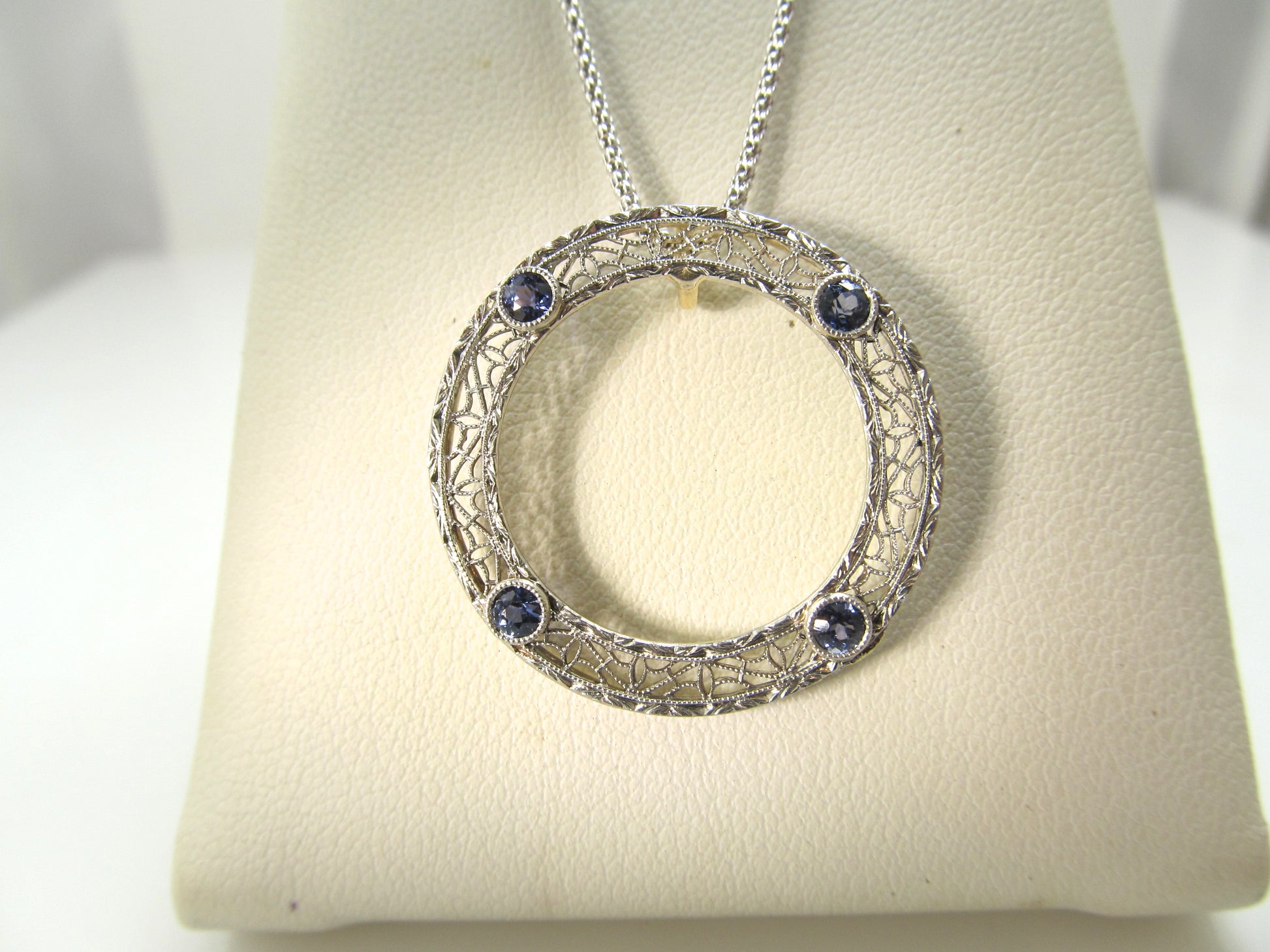 Filigree sapphire circle necklace, circa 1920