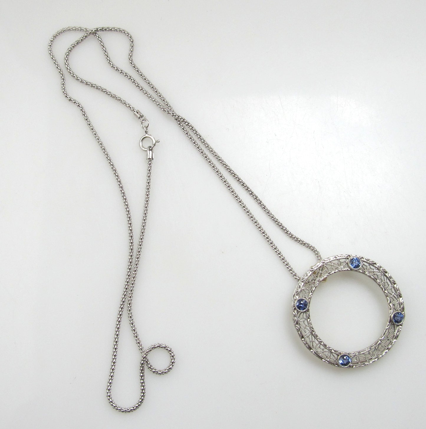 Antique filigree circle necklace with sapphires, circa 1920