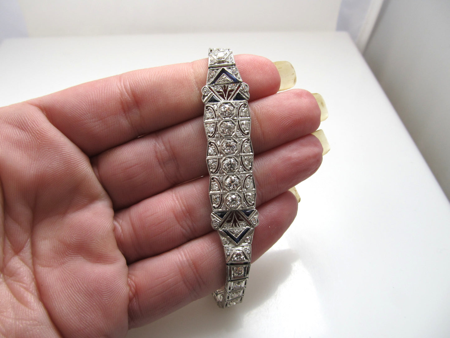 Antique platinum bracelet with sapphires and 4.40cts in diamonds, circa 1920