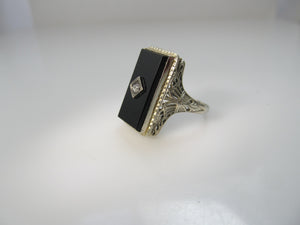 Art Deco onyx and diamond ring, 14k white gold filigree