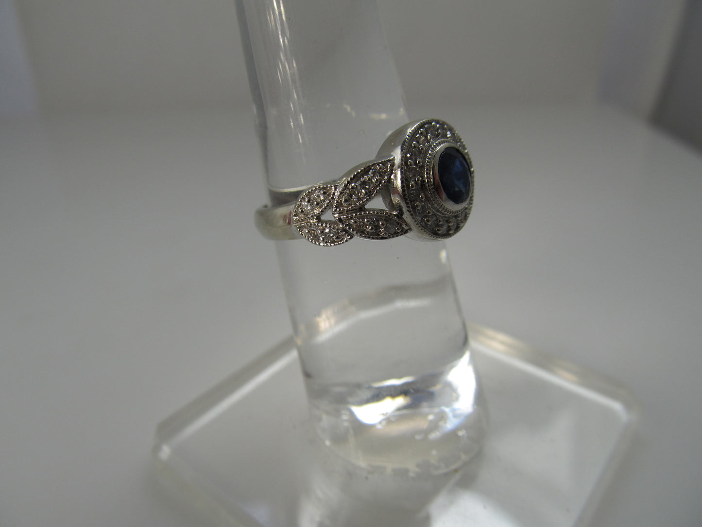 Sapphire and diamond halo ring, 14k white gold