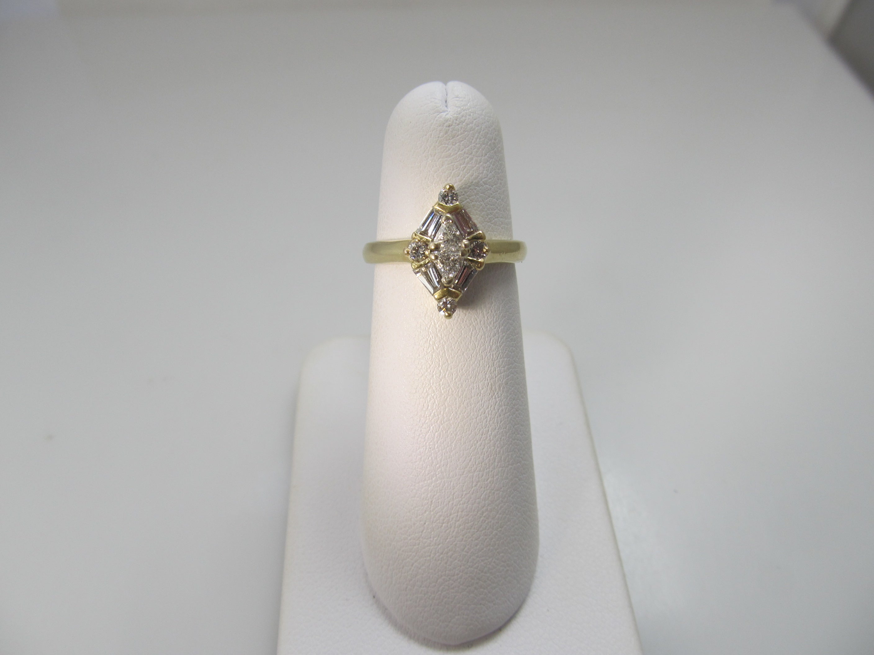 Vintage marquise shaped diamond ring, 14k yellow gold