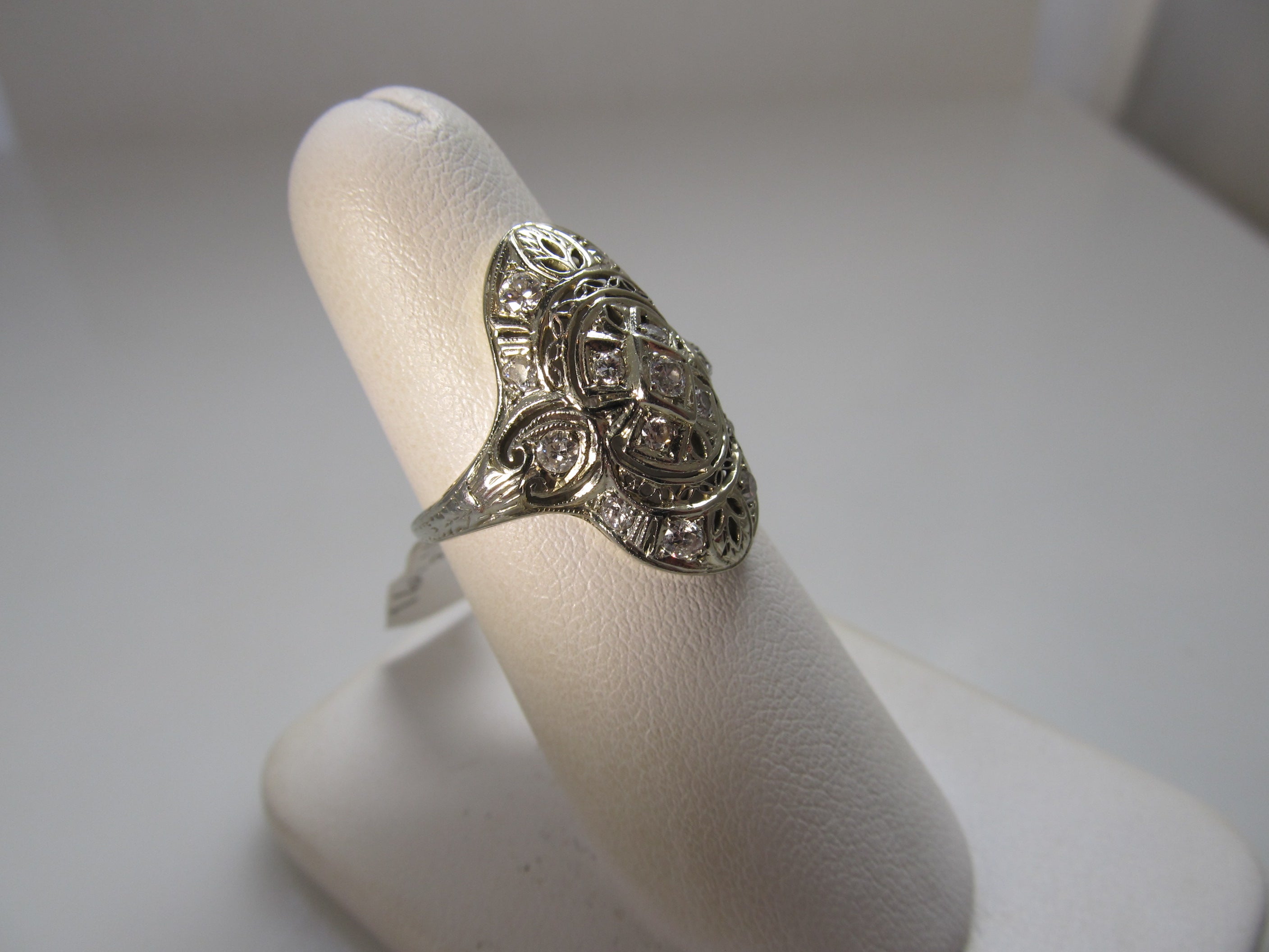 Vintage long filigree diamond ring