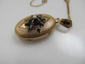 Victorian gold locket with enamel and a pearl