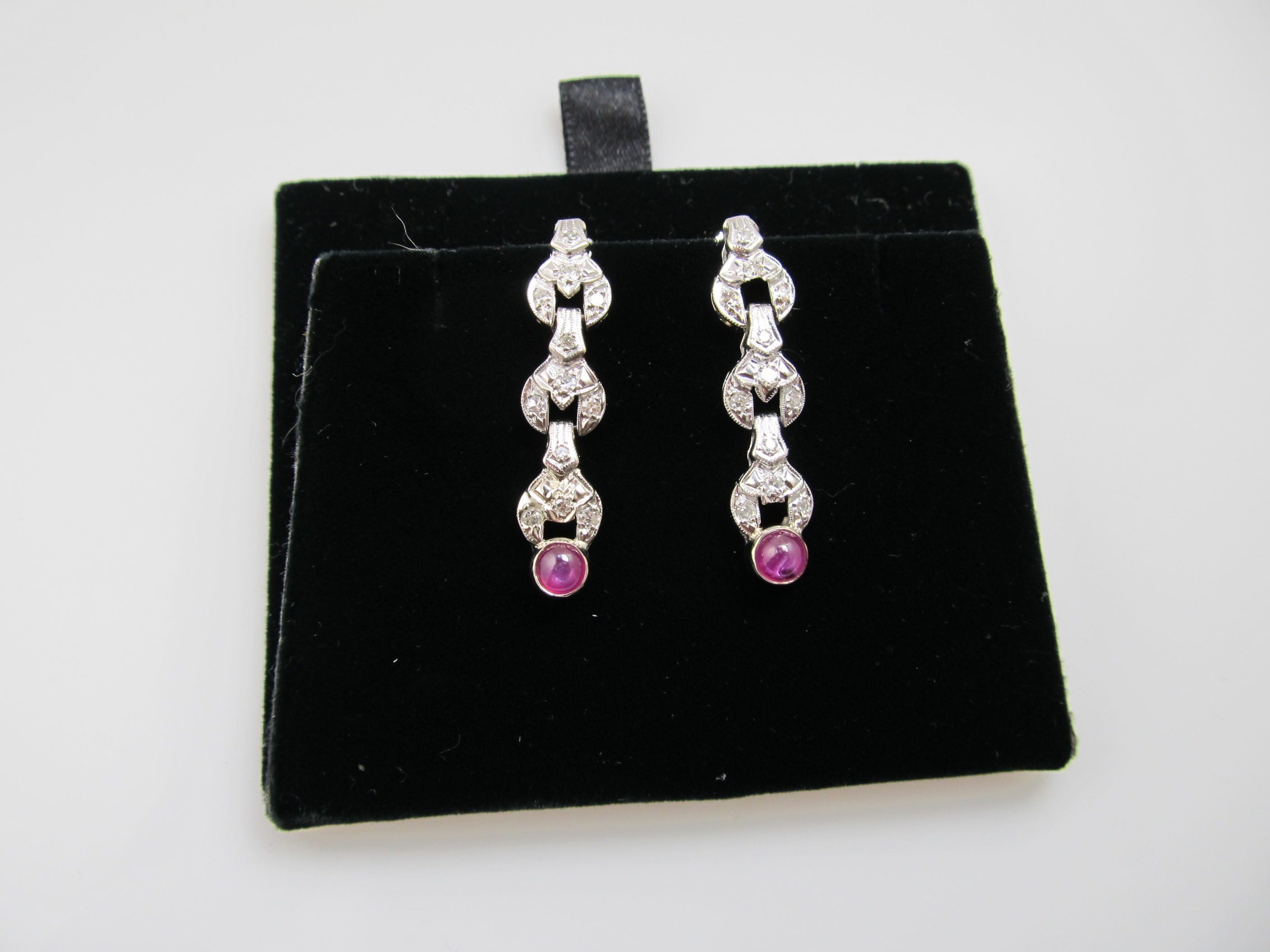 Vintage platinum drop earrings with diamonds and star ruby