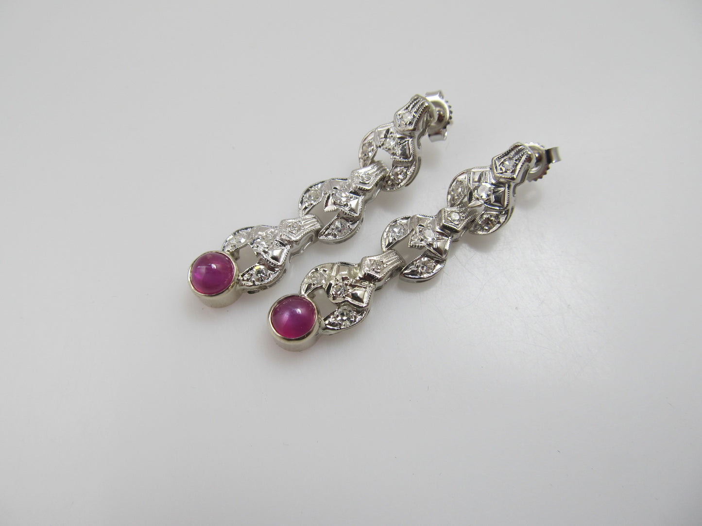 Vintage platinum drop earrings with diamonds and star ruby