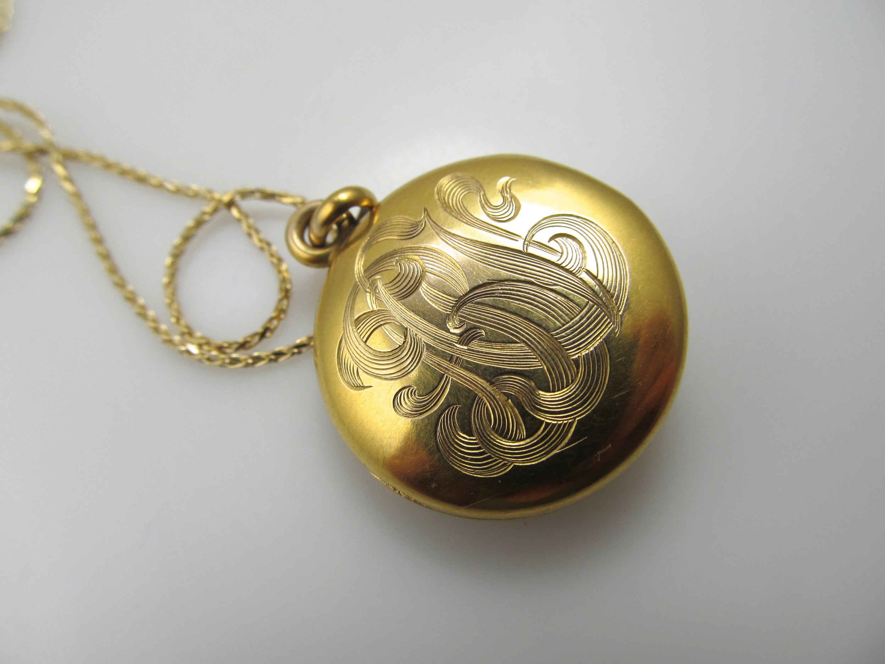 Art Nouveau 14k emerald eye griffin locket