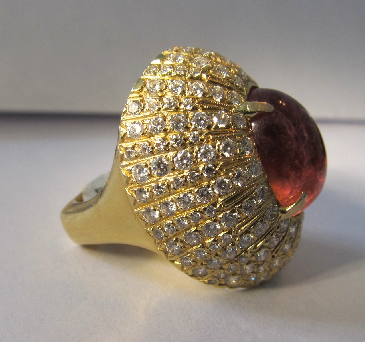 18k yellow gold ring with an 8ct pink tourmaline and 2cts in diamonds, VS1-2 F-G