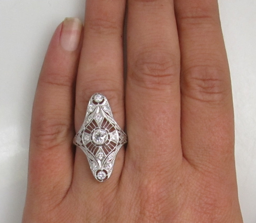 14k white gold filigree ring with 1ct TW in OEC diamonds, SI1 F-G, circa 1920