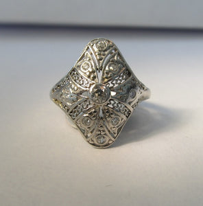 Long antique filigree diamond pinky ring in platinum