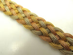 18k white rose and yellow gold woven bracelet.