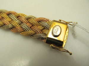 18k white rose and yellow gold woven bracelet.