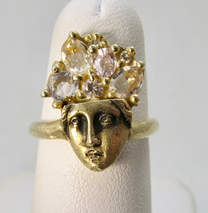 Really neat morganite lady face ring