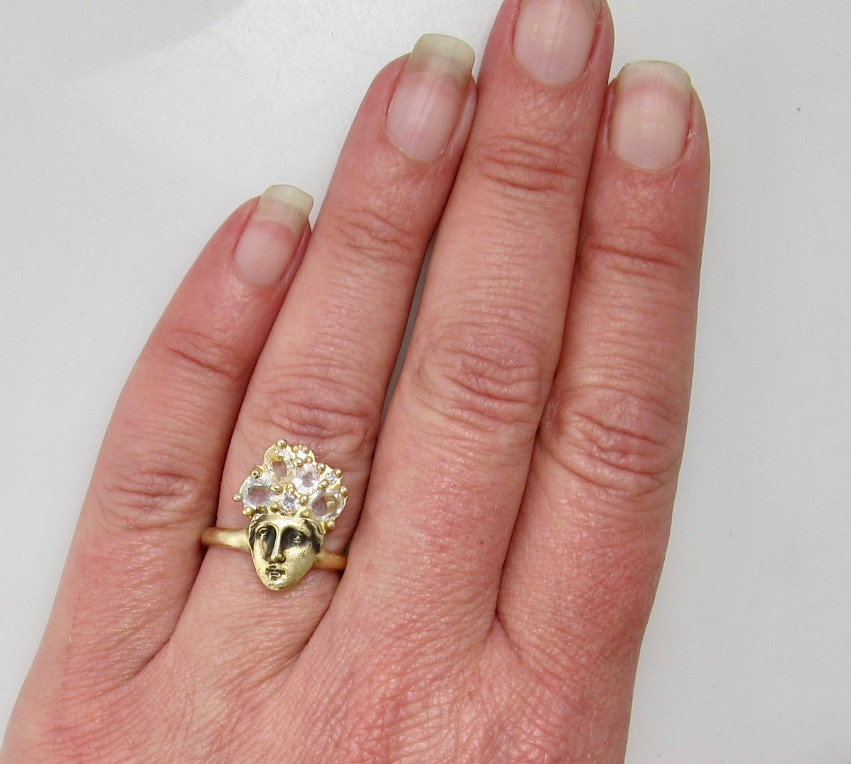 Really neat morganite lady face ring