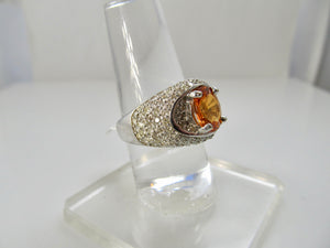 Bright orange natural sapphire diamond ring