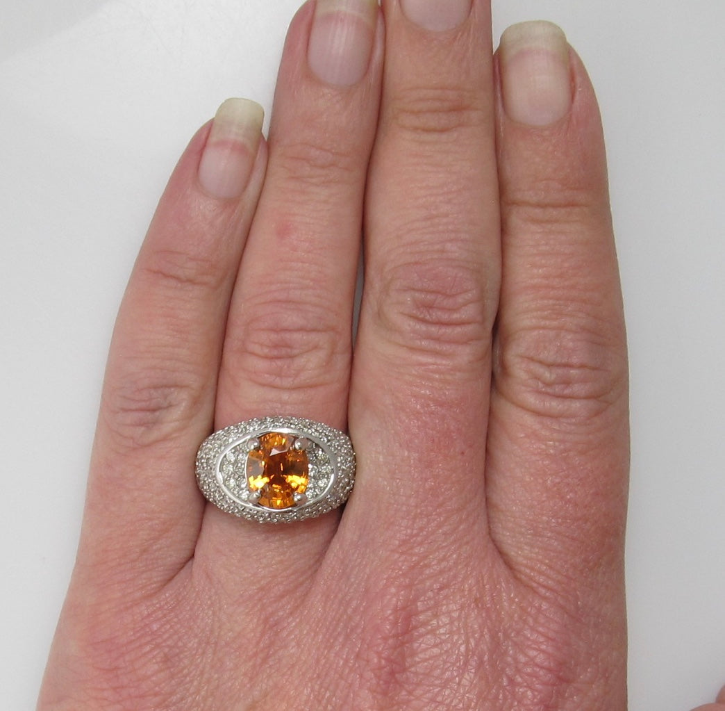 Bright orange natural sapphire diamond ring