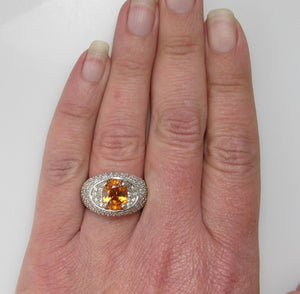 Bright orange natural sapphire diamond ring