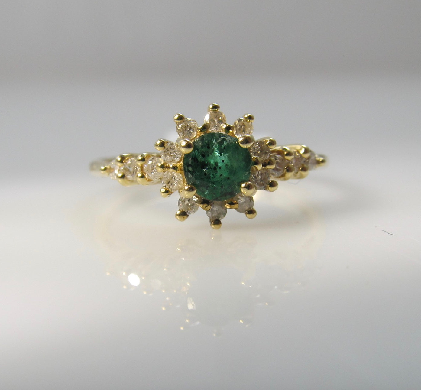 Emerald and diamond pinky ring