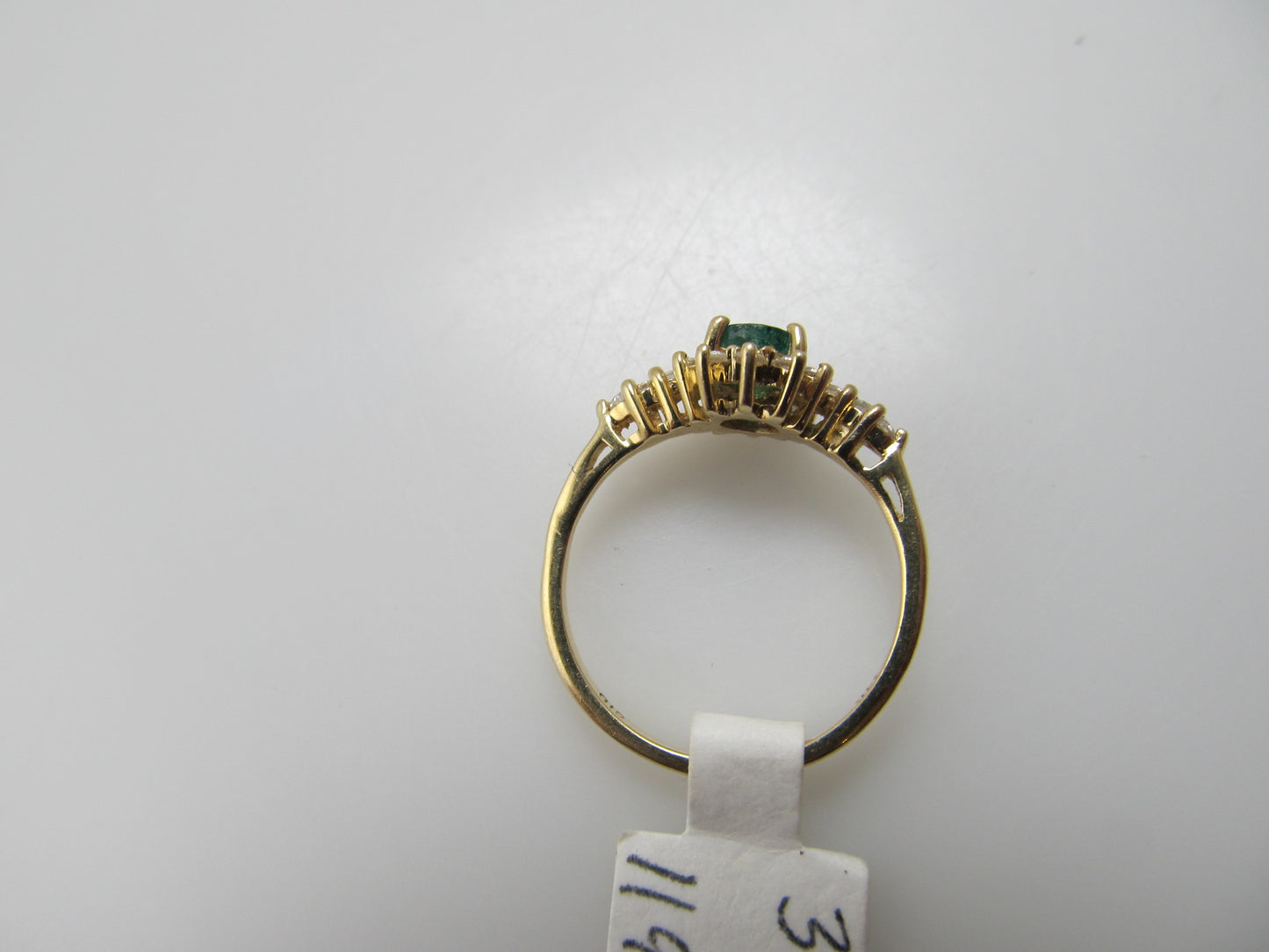 Emerald and diamond pinky ring