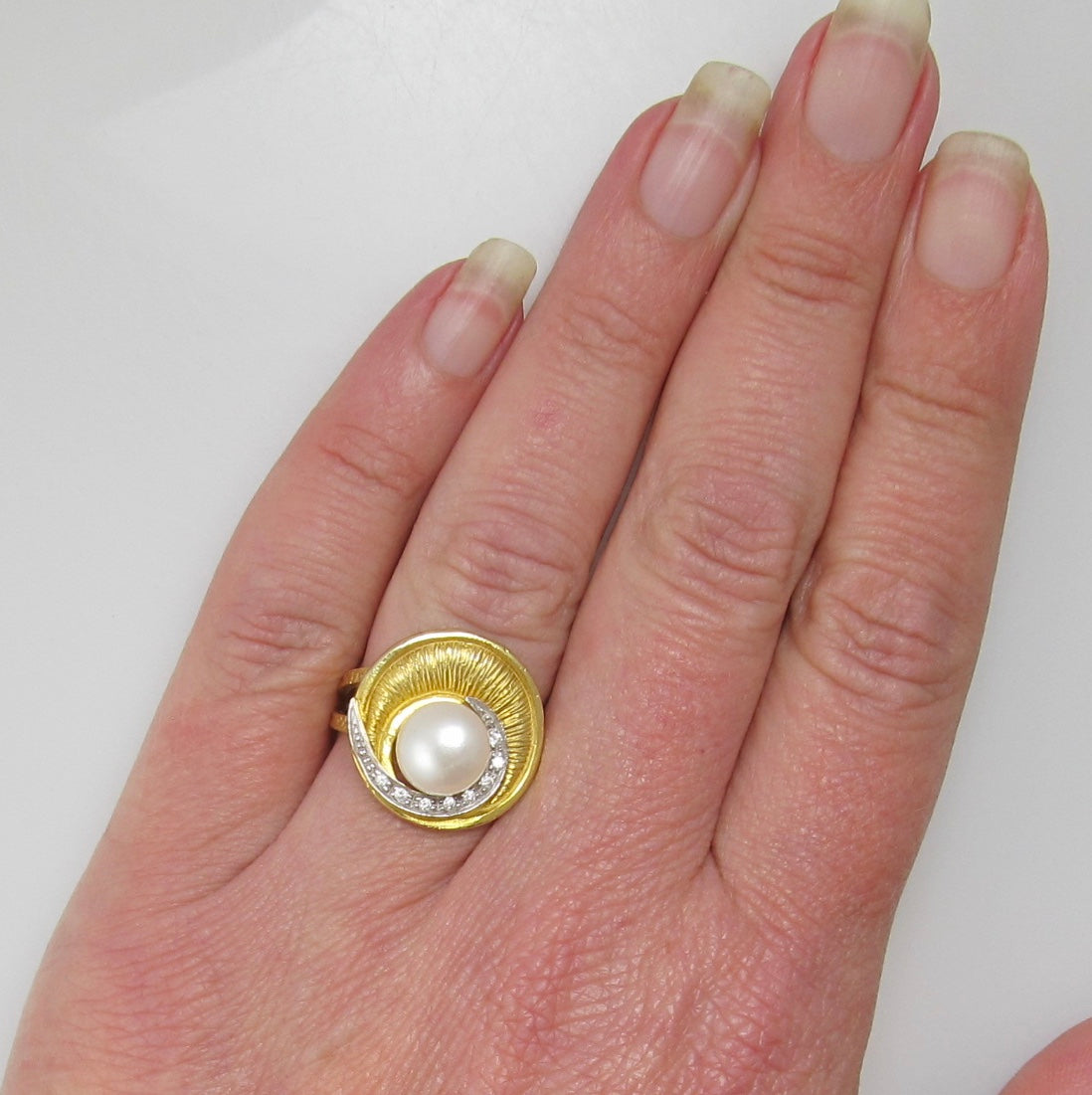 Yellow gold pearl and diamond ring