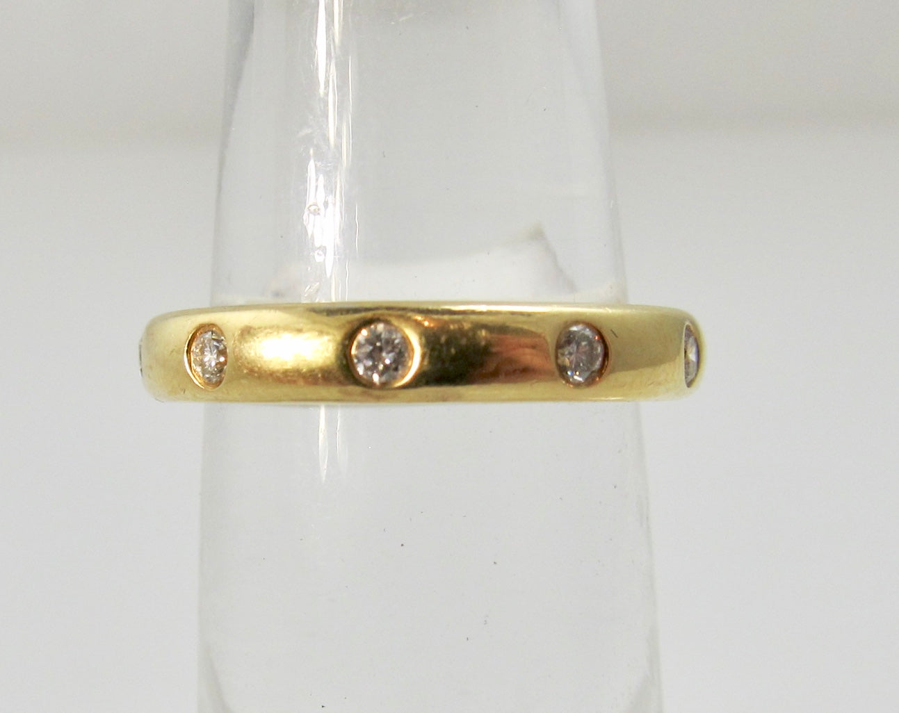 18k flush set diamond band