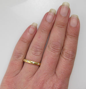 18k flush set diamond band