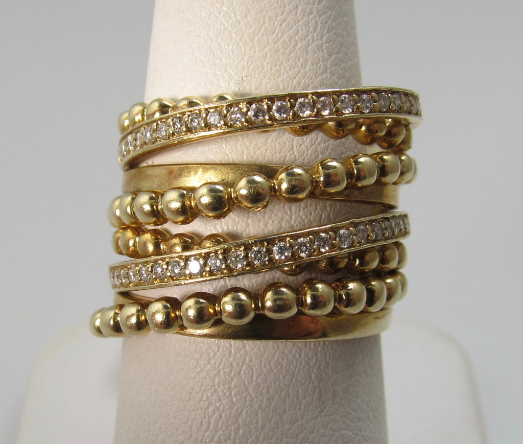 Wide yellow gold diamond multi band ring