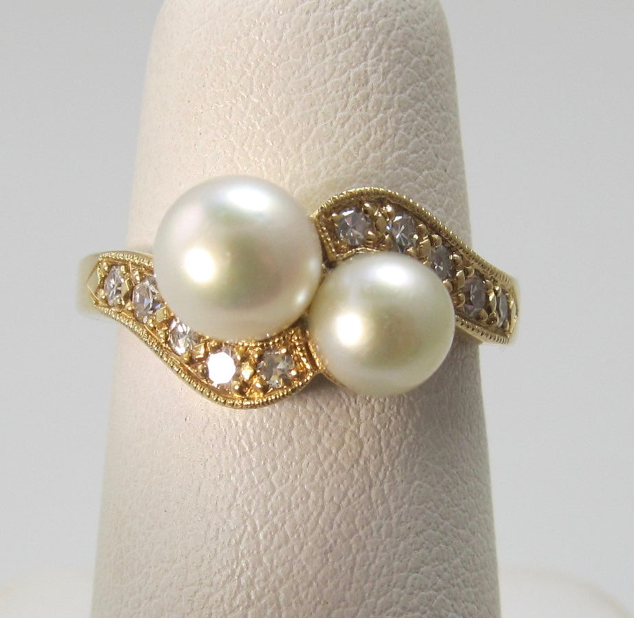 Pearl and diamond bypass ring