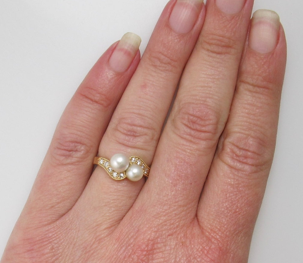 Pearl and diamond bypass ring