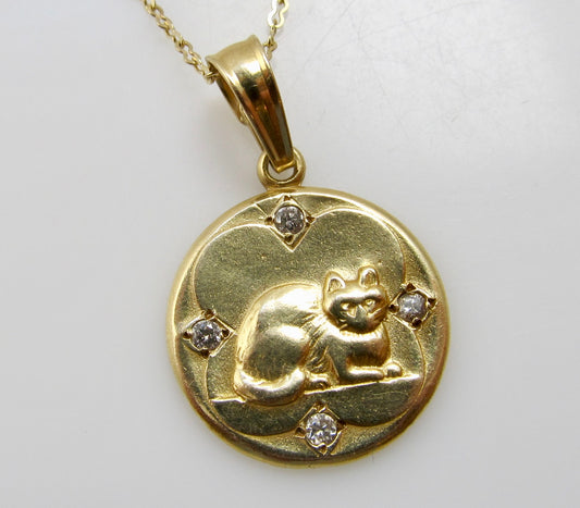 Yellow gold diamond cat necklace