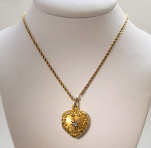 Antique heart shaped diamond locket