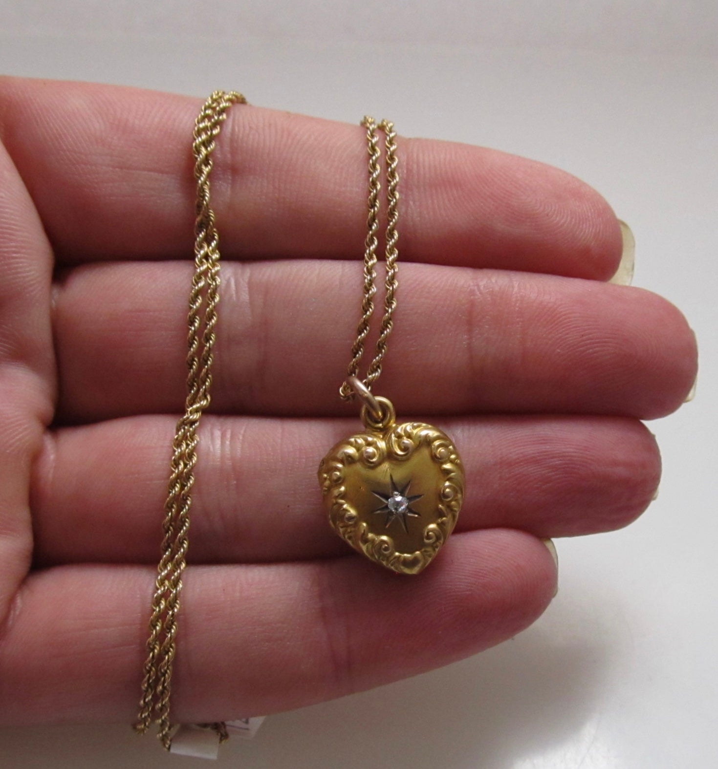 Antique heart shaped diamond locket