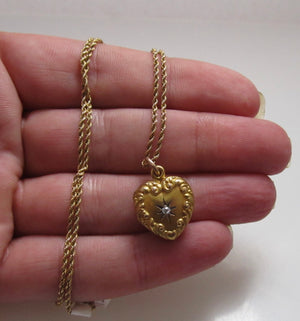 Antique heart shaped diamond locket