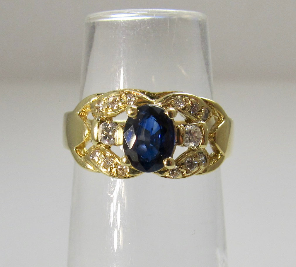 Yellow gold sapphire and diamond ring