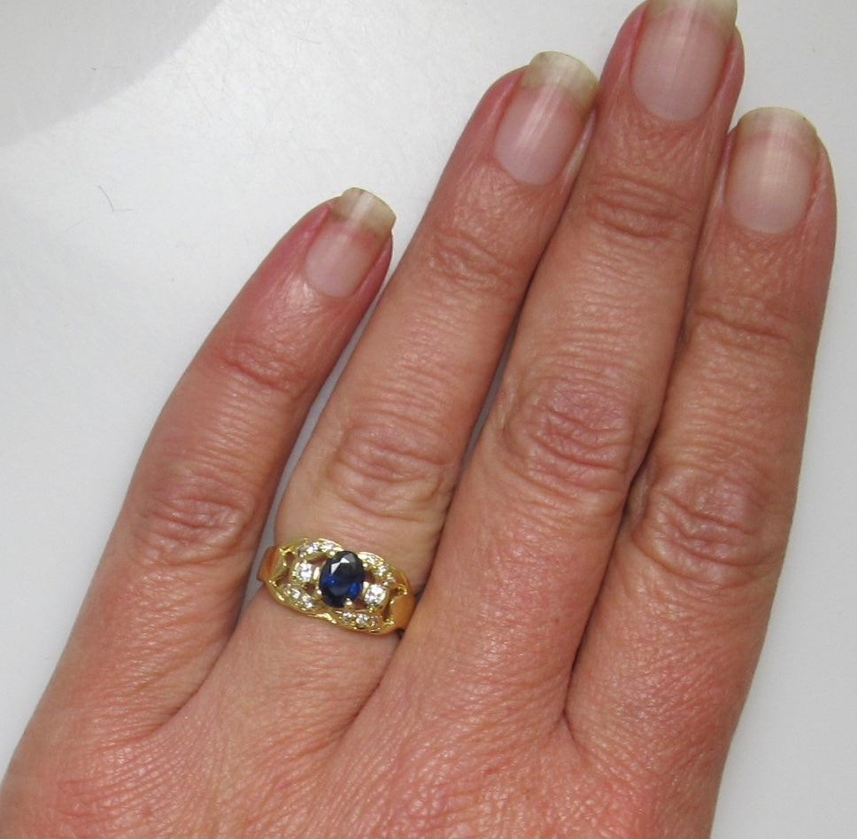 Yellow gold sapphire and diamond ring