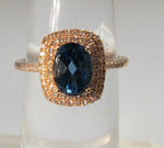 Rose gold blue topaz ring