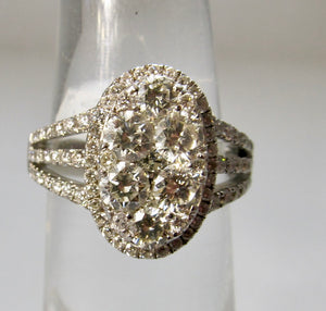 Oval cluster diamond ring
