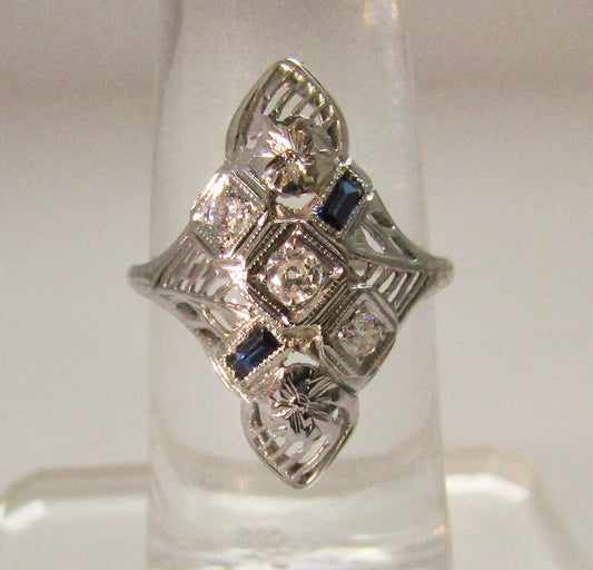 Long filigree diamond ring