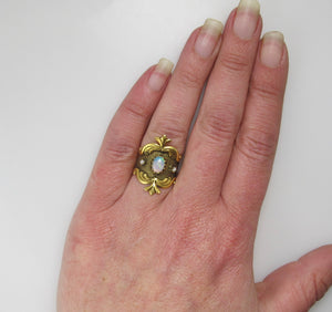 Wide yellow gold cigar band with opal and pearls